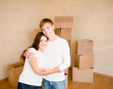 Loading boxes and furniture into a van for a Northwood move